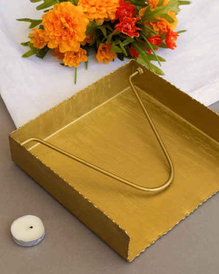 Brushed Gold Napkin Holder with Orange Flowers in Background