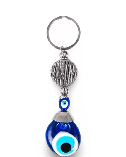 Keychain with blue evil eye charm and silver accents on a white background