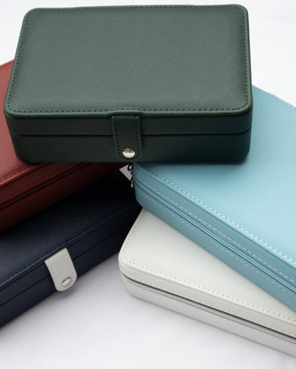 Stack Of Rectangular Leather Jewelry Boxes In Various Colors