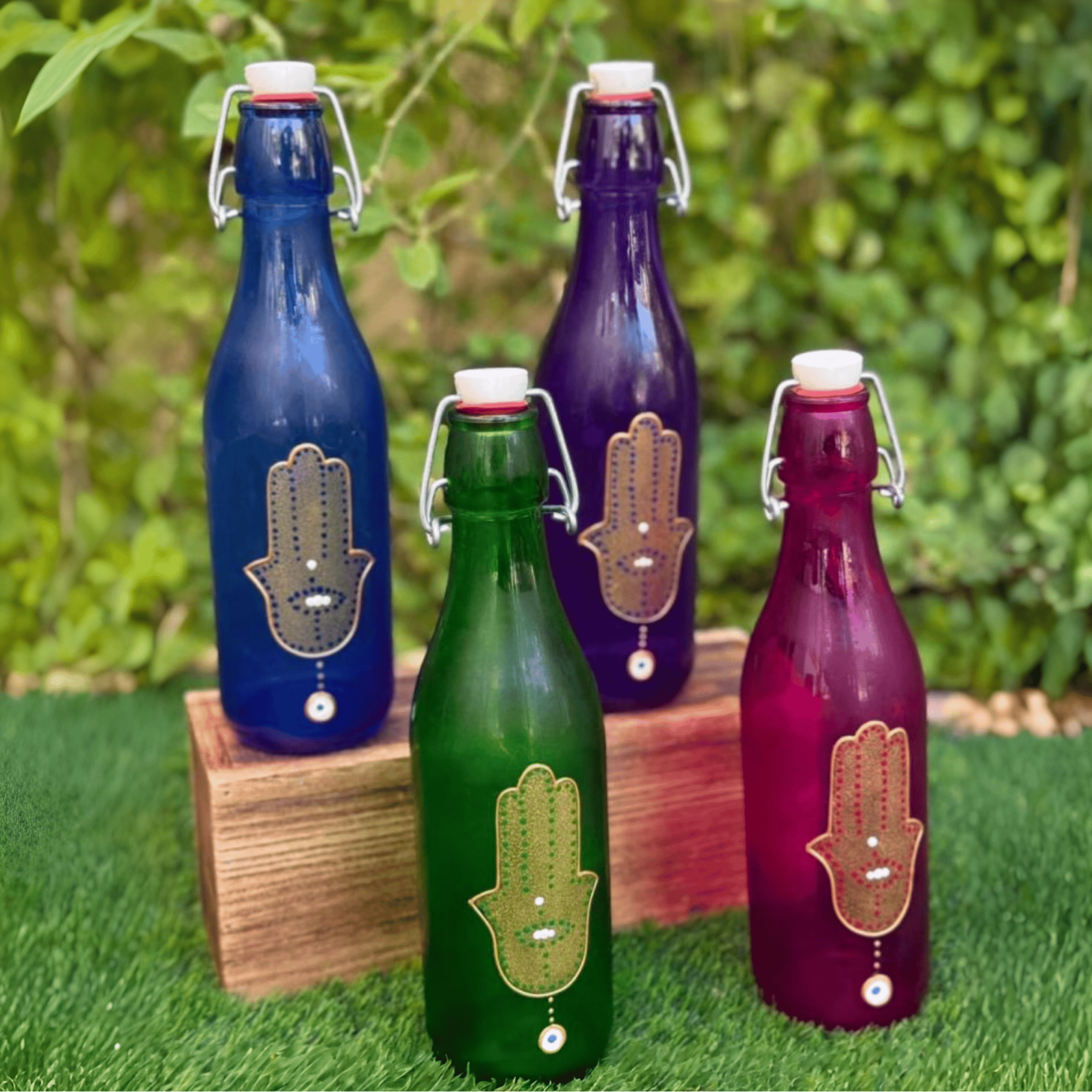 Casa Duniya's Hand-Painted Hamsa Colorful Swing-Top Water Bottles