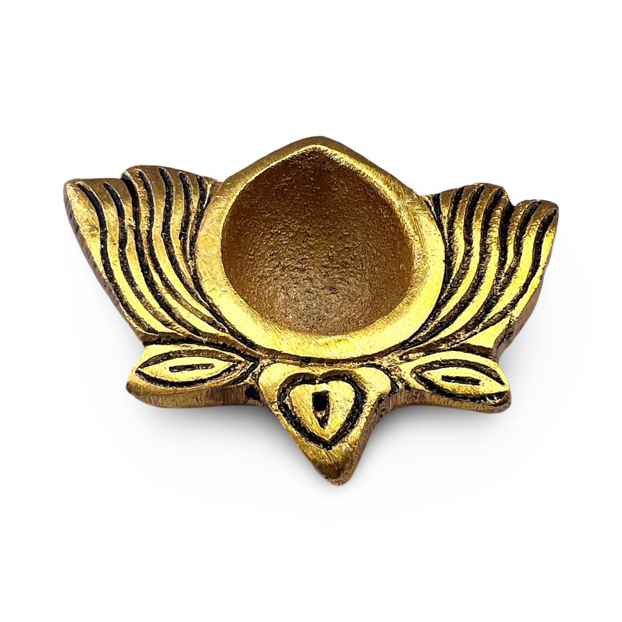 Gold metal diya holder from India