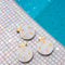 Casa Duniya's White Marble With Brass Inlay Pomegranate Granada Coasters at the Poolside