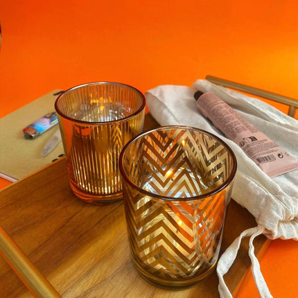 Gold Candle Holder on a wooden board