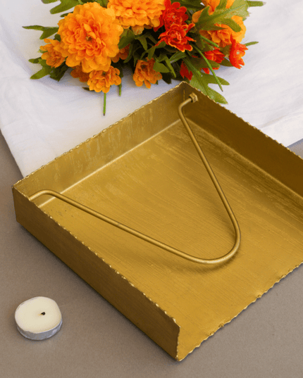 Brushed Gold Napkin Holder with Orange Flowers in Background