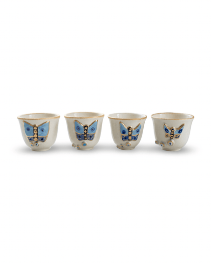 Farah butterfly espresso cup with blue and gold butterfly decoration and gold rim, made in Jordan