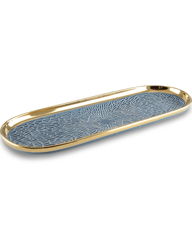 Decorative tray with blue pattern and gold rim on a white background
