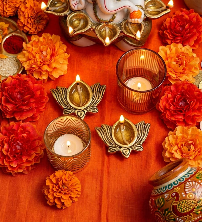 Diwali Diya & Glow Trio: two metal diya holders with Mira and Isha gold glass candle holders