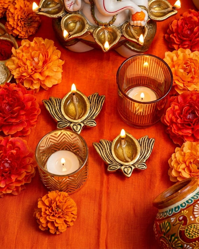 Diwali Diya & Glow Trio: two metal diya holders with Mira and Isha gold glass candle holders