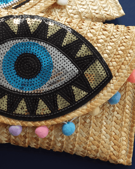 Casa Duniya Sequin Evil Eye Straw Clutch Elongated Aviva Clutch