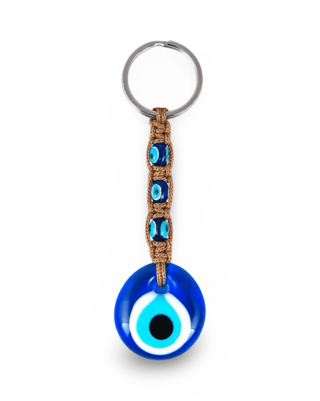 Keychain with blue evil eye design with brown macrame on a white background