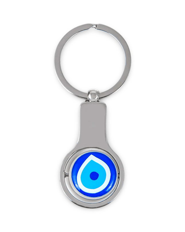 Keychain with blue evil eye design on a white background