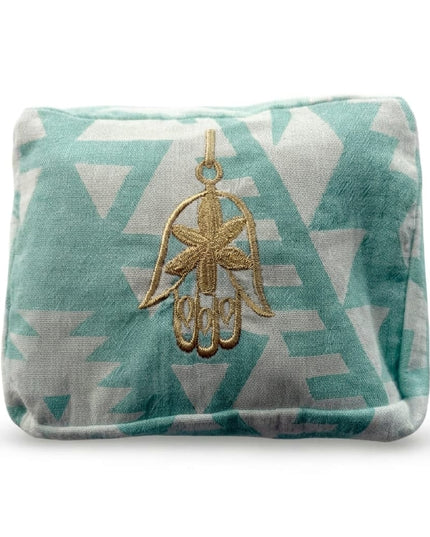 Cyan Ohana Cosmetic Pouch with hand-embroidered evil eye design