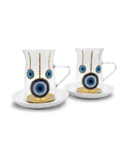 Hand-painted evil eye glass tea cups with handles and round white saucers, made by artisans in Jordan
