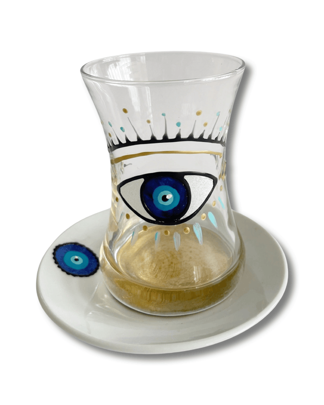 Big Eye Nazar teacups with white saucers, hand-painted with a blue evil eye