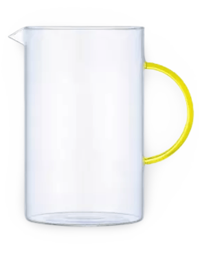 Glass Pitcher with Yellow Handle on White Background