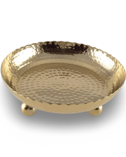 Hammered Gold decorative bowl with round feet on a white background