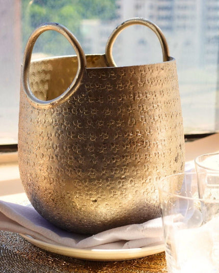 Hammered Silver Ice Bucket On A Silver Beaded Placemat