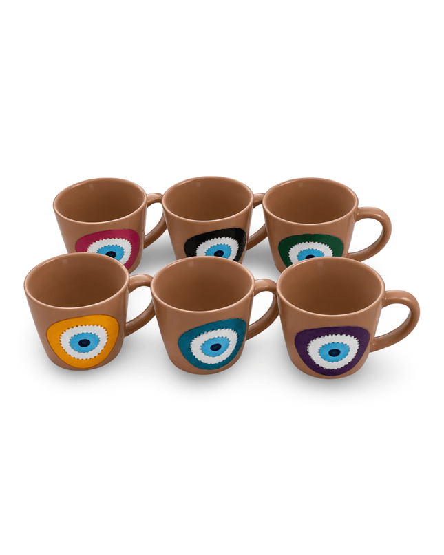 Set of 6 hand-painted evil eye porcelain mugs from Jordan, each a different color: magenta, black, green, orange, teal, and purple