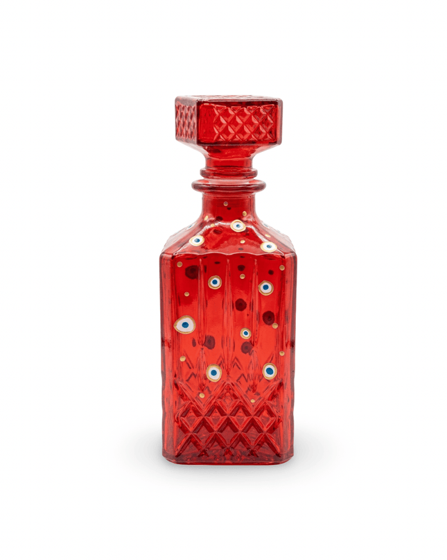 Red crystal square decanter with stopper, hand-painted with white and blue evil eyes