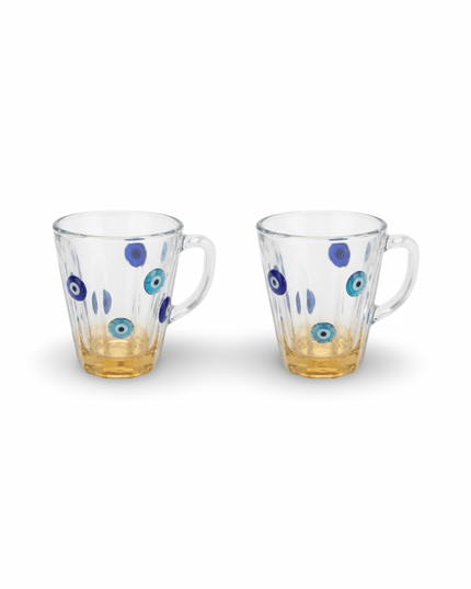 Set of 2 hand-painted evil eye glass mugs from Jordan with gold bases