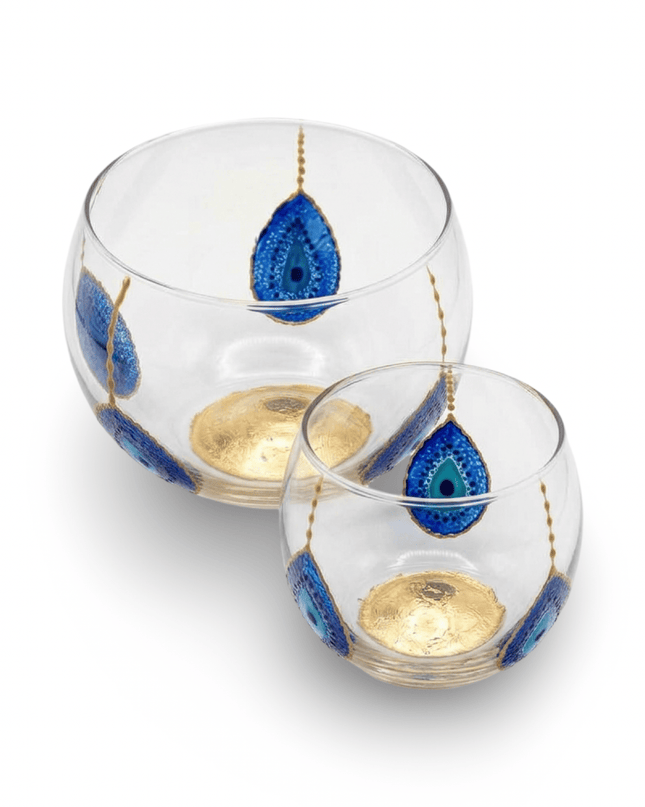 Lila round clear glass bowls hand-painted with blue and gold evil eyes