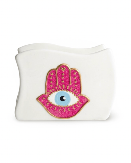 One side of the Jewel Hamsa Napkin Holder, hand-painted evil eye design on white porcelain