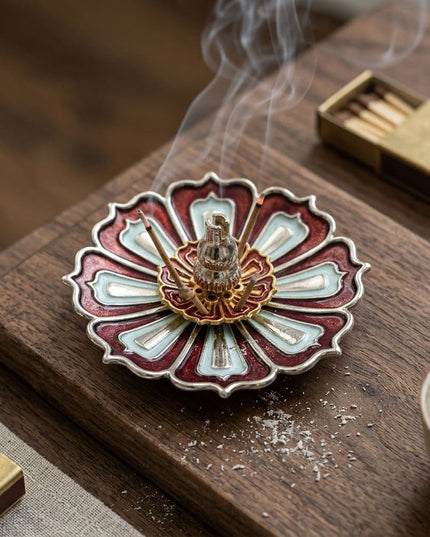 Meena incense holder in use on a wooden table with matches