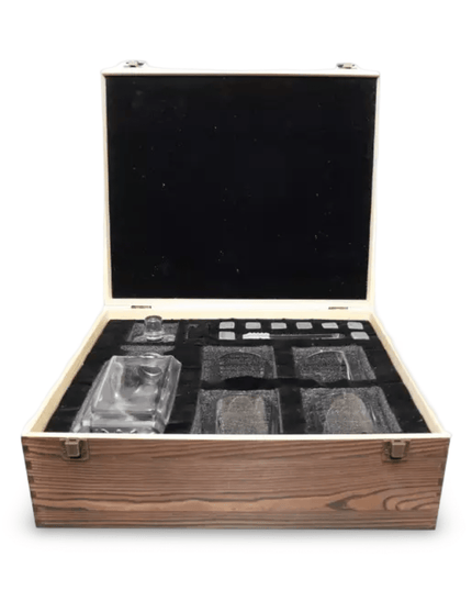 Set of glass tumblers and decanter in a wooden box on a white background