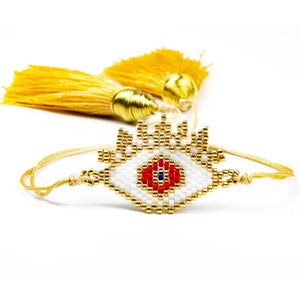 Gold Beaded Bracelet with White and Red Evil Eye