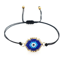 Load image into Gallery viewer, Black Beaded Bracelet with Blue Evil Eye

