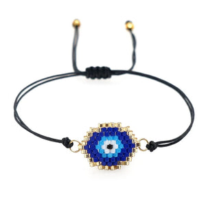 Black Beaded Bracelet with Blue Evil Eye