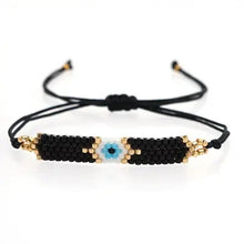 Load image into Gallery viewer, Black Beaded Bracelet with White and Blue Evil Eye
