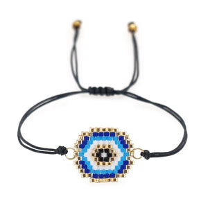 Black Beaded Bracelet with Blue and White Evil Eye