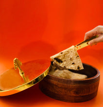 Load image into Gallery viewer, Wooden Chapati Box with  Gold Peacock  Lid and tongs holding chapati
