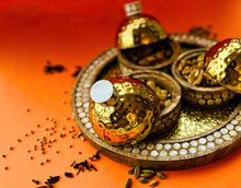 Load image into Gallery viewer, Gold, wood and mother of pearl hammered tray with containers and nuts
