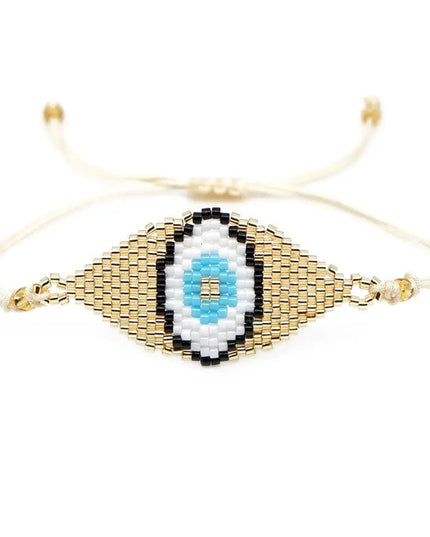Gold Beaded Bracelet with Gold Evil Eye